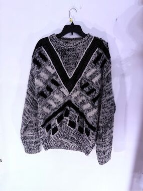 NICHOLAS Chunky Knit Crew Neck Sweater with real leather V accent.